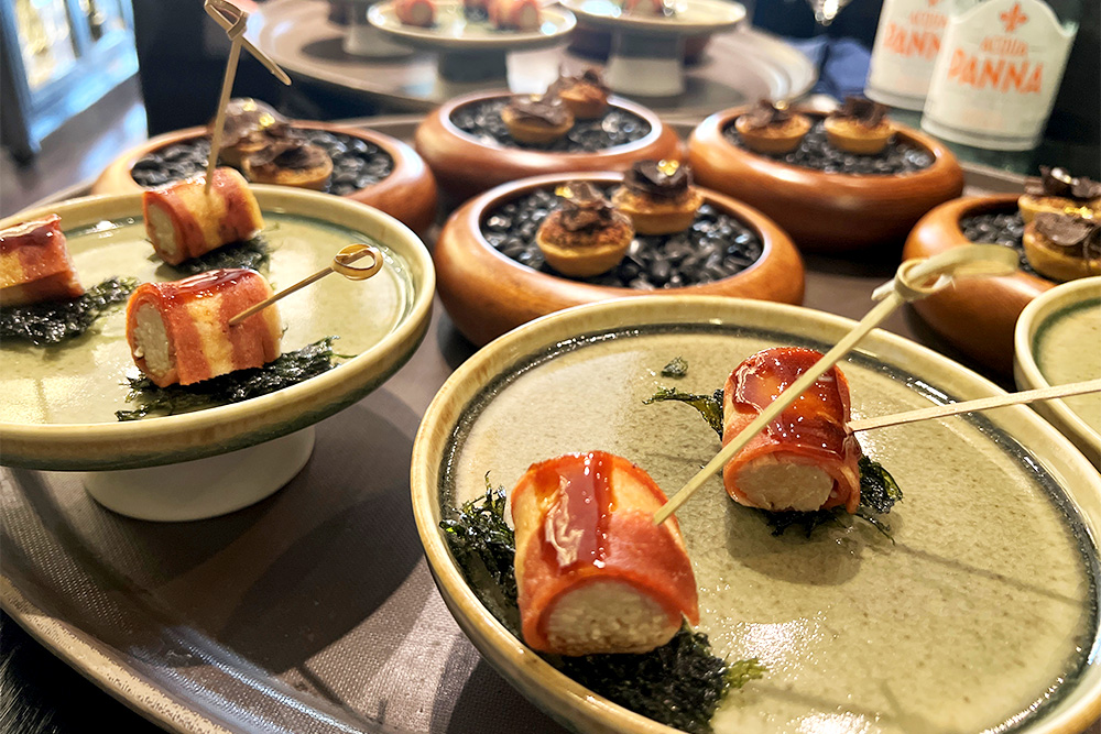 The meat-wrapped rice balls were made with plant-based bacon.